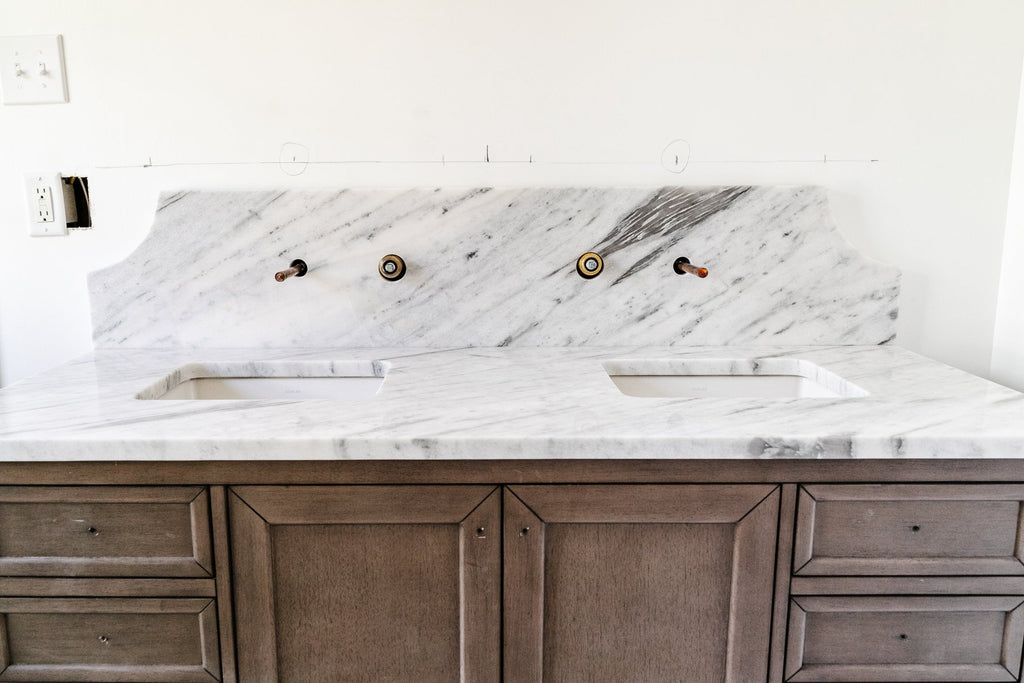 Our Scalloped Marble Backsplash in the Bathroom Reno