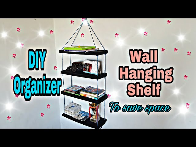 DIY wall hanging book shelf/ organizer book shelf from cardboard