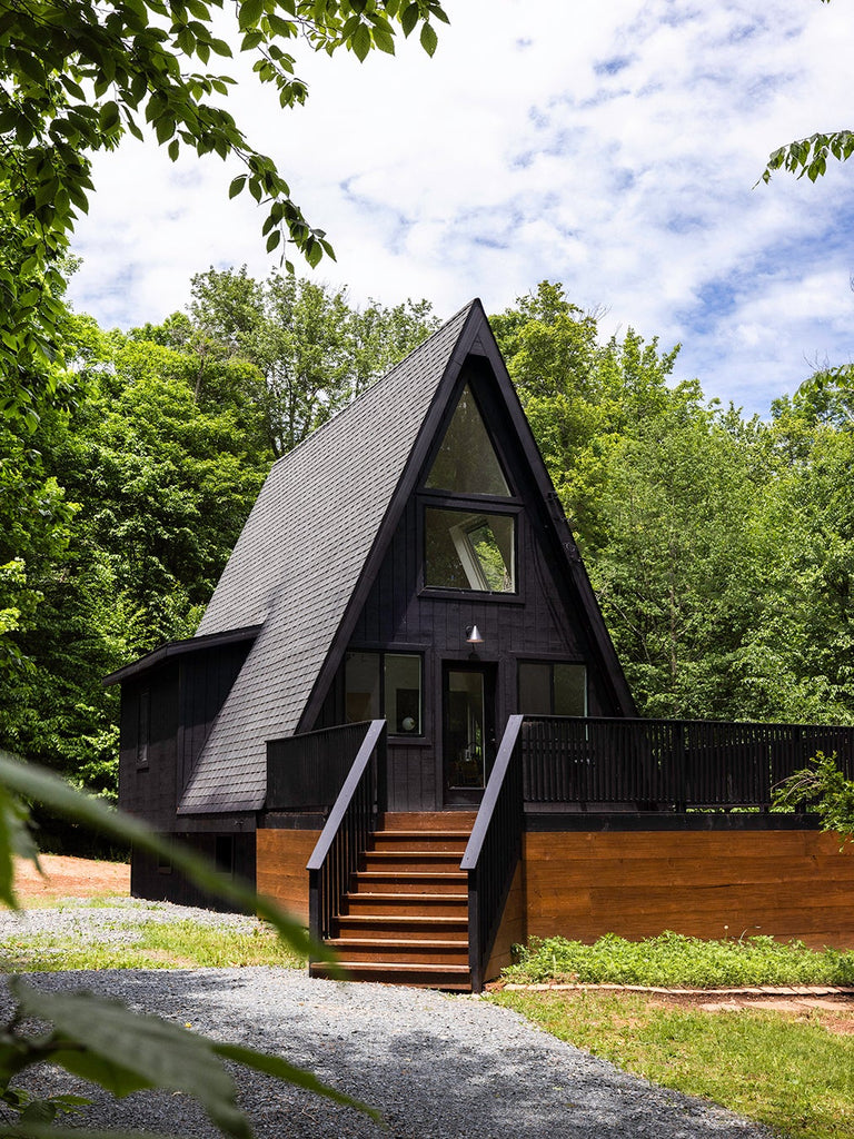 The Moodiness of This A-Frame Cabin’s Inky Black Exterior Stops There
